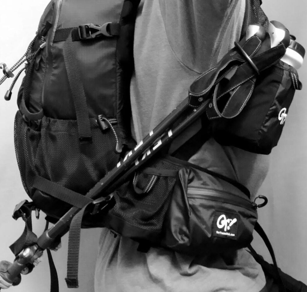 OutThere bottle tails shown on hiking backpack